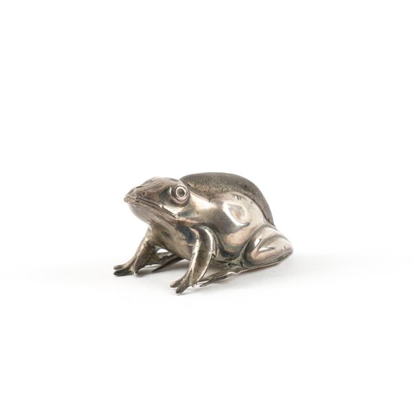 A SILVER FROG PIN CUSHION