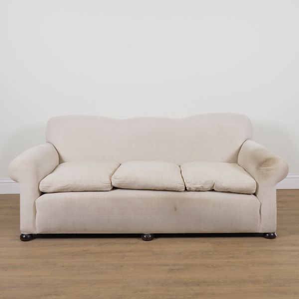 A HUMPBACK THREE SEAT SOFA