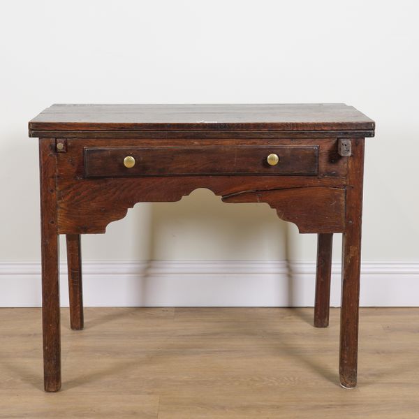 AN 18TH CENTURY OAK FOLDOVER WRITING TABLE