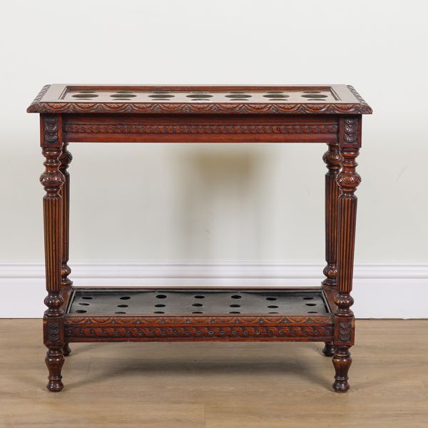 A VICTORIAN WALNUT STICK STAND