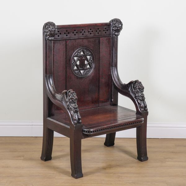 A 17TH CENTURY STYLE OAK ARMCHAIR