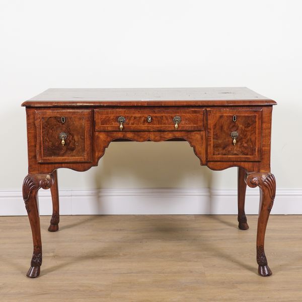 A MID 18TH CENTURY CROSS BANDED WALNUT WRITING TABLE