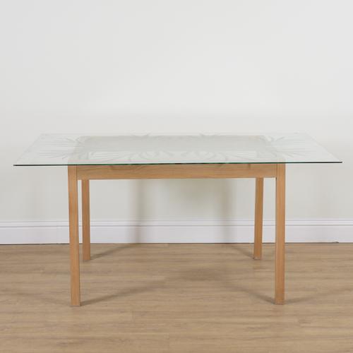 JANE RAVEN; A 20TH CENTURY GLASS TOPPED DINING TABLE