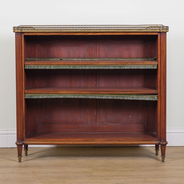 A LOUIS XVI GILT METAL MOUNTED WALNUT OPEN BOOKCASE