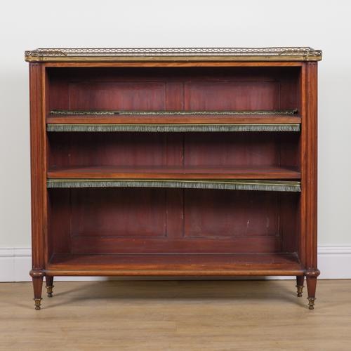 A LOUIS XVI GILT METAL MOUNTED WALNUT OPEN BOOKCASE
