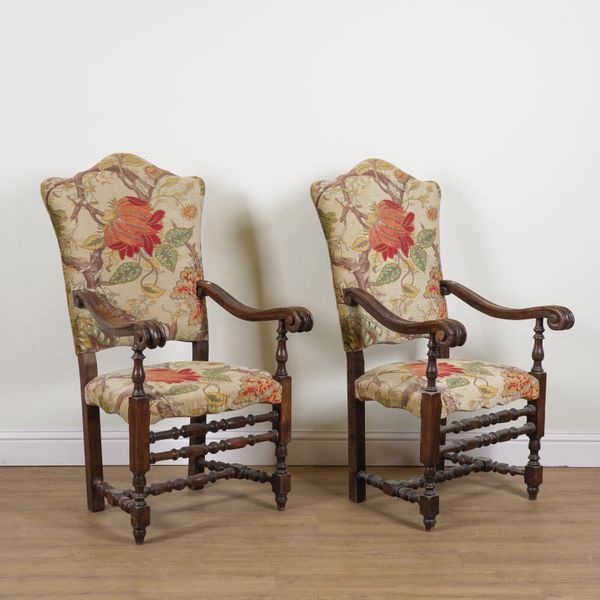 A PAIR OF FRENCH 18TH CENTURY STYLE WALNUT FRAMED HIGHBACK OPEN ARMCHAIRS (2)