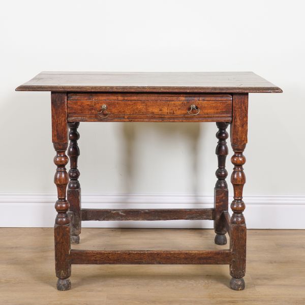 A 17TH CENTURY OAK SINGLE DRAWER SIDE TABLE