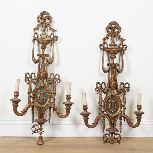 A PAIR OF LOUIS XVI STYLE GILT-WOOD TWIN LIGHT WALL APPLIQUES (2)
