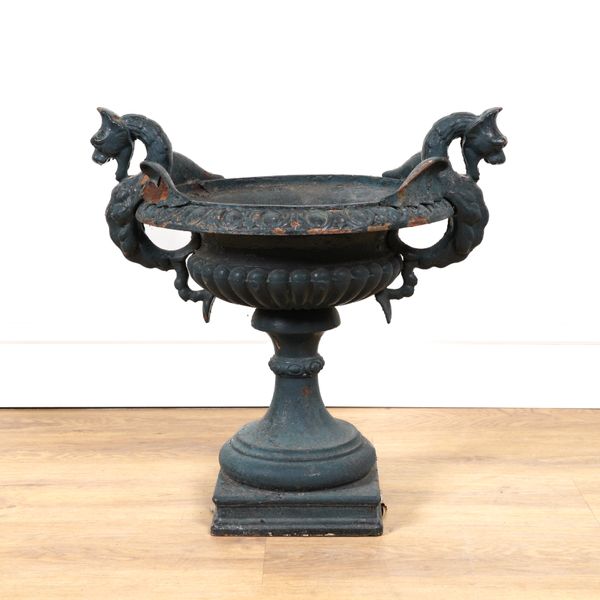 A NEO-CLASSICAL STYLE DARK GREEN PAINTED CAST-IRON TWIN-HANDLED URN