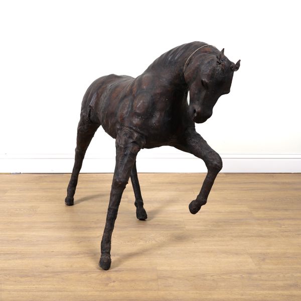 RETAILED BY LIBERTY & CO. LONDON: A LEATHER MODEL OF A HORSE