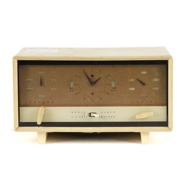 E.K COLE: A MID-20TH CENTURY CREAM BAKELITE RADIO ALARM CLOCK