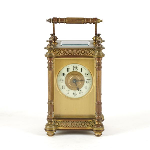 A FRENCH GILT-BRASS CORNICHE CARRIAGE CLOCK TIMEPIECE