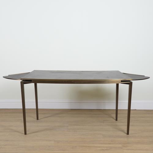 CARTIER;  A BRONZE LEATHER INSET CONCAVE WRITING DESK