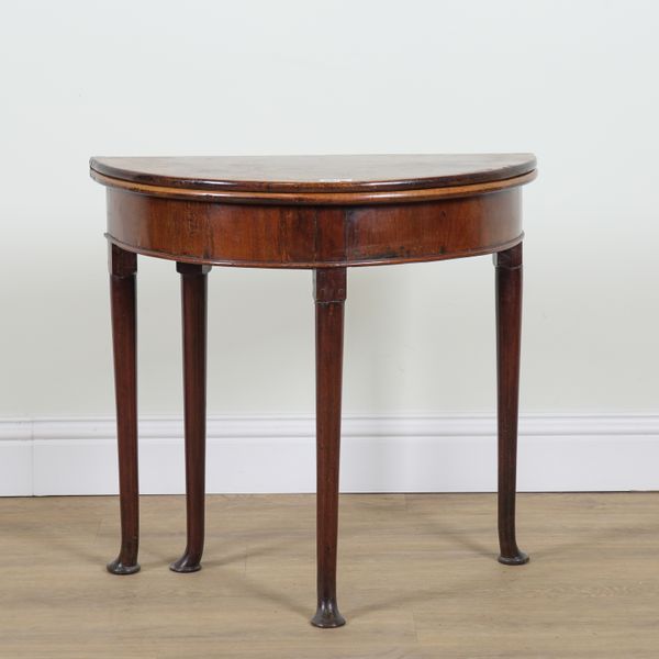 A MID 18TH CENTURY WALNUT DEMI-LUME FOLDOVER TEA TABLE