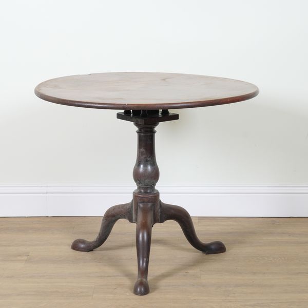 A MID 18TH CENTURY MAHOGANY CIRCULAR SNAP TOP TRIPOD TABLE