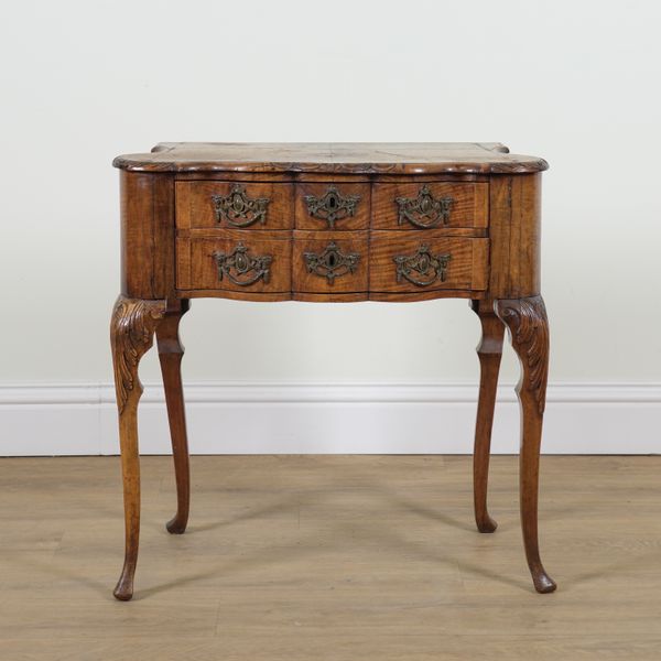 A LATE 18TH CENTURY DUTCH MAHOGANY SHAPED TWO DRAWER LOW BOY