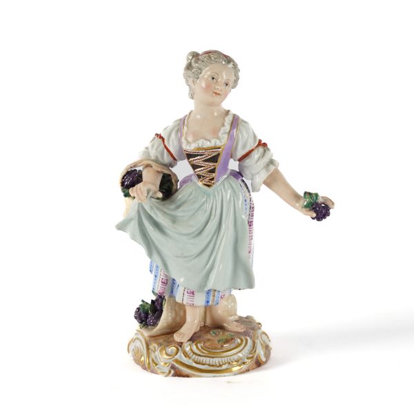 A MEISSEN FIGURE OF A GIRL