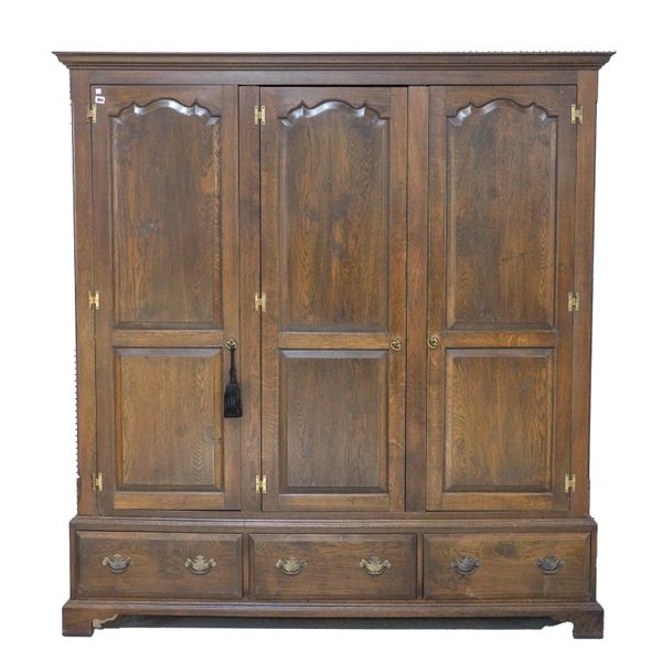 AN OAK TRIPLE WARDROBE