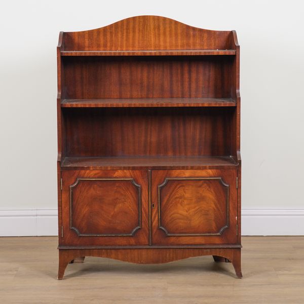 A GEORGE III STYLE MAHOGANY WATERFALL BOOKCASE