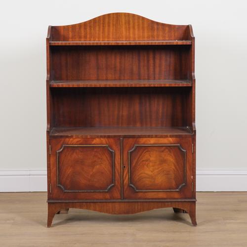 A GEORGE III STYLE MAHOGANY WATERFALL BOOKCASE