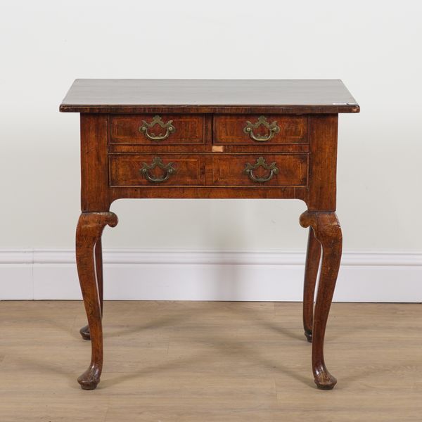 A MID 18TH CENTURY WALNUT THREE DRAWER LOWBOY