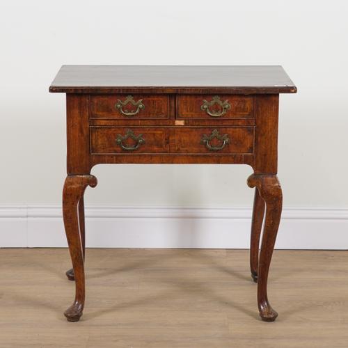 A MID 18TH CENTURY WALNUT THREE DRAWER LOWBOY