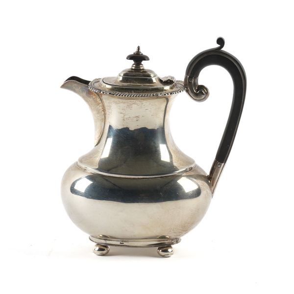 A SILVER HOT WATER JUG