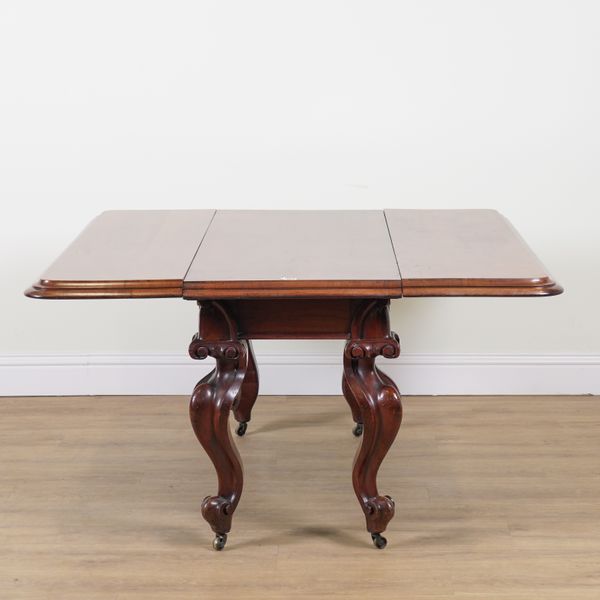 A VICTORIAN MAHOGANY DROP FLAP DINING TABLE