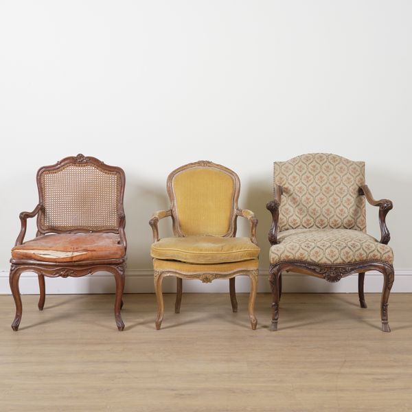 A LOUIS XV AND LATER CARVED STAINED BEECH FRAMED OPEN CANE ARMCHAIR (3)