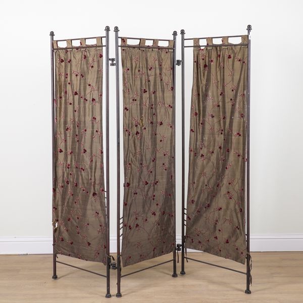 A 20TH CENTURY TUBULAR METAL FRAMED THREE FOLD SCREEN