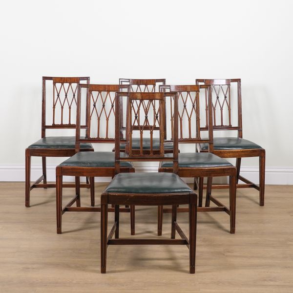 A SET OF SIX EDWARDIAN MAHOGANY LATTICE BACKED DINING CHAIRS (6)