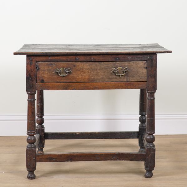 A 17TH CENTURY OAK SINGLE DRAWER SIDE TABLE