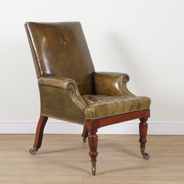 A VICTORIAN MAHOGANY FRAMED GREEN LEATHER UPHOLSTERED LIBRARY CHAIR