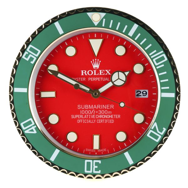 A METAL WALL CLOCK IN THE STYLE OF A ROLEX SUBMARINER