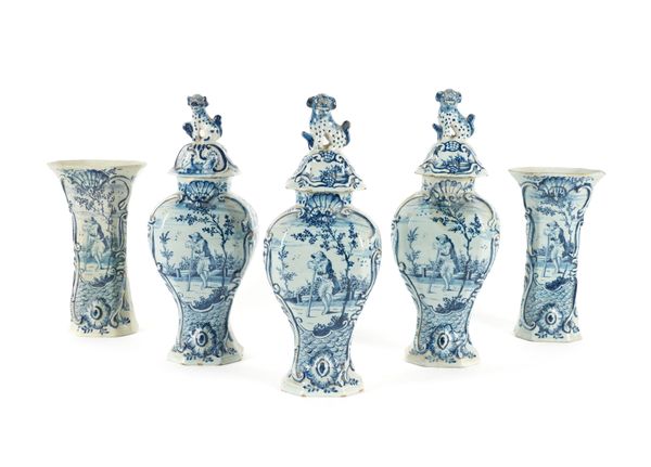 A DUTCH DELFT GARNITURE OF FIVE BLUE AND WHITE VASES (8)