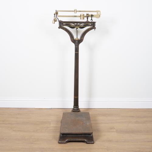 FAIRBANKS & CO.: A SET OF AMERICAN PAINTED CAST IRON AND BRASS STANDING WEIGHING SCALES