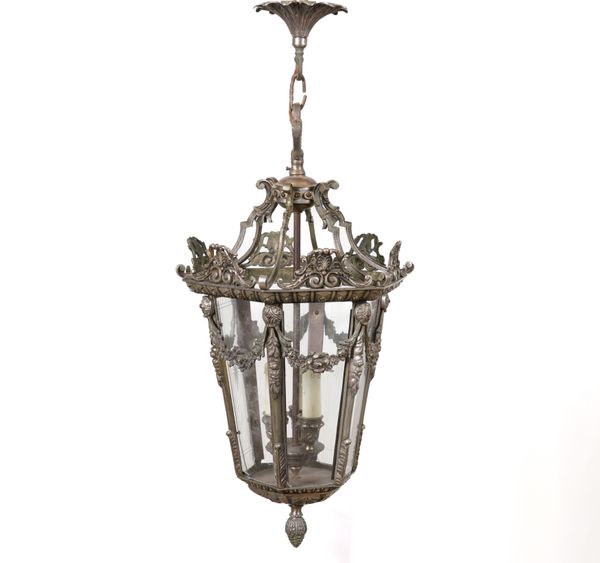 A LOUIS XVI STYLE SILVERED METAL HEXAGONAL HANGING LANTERN