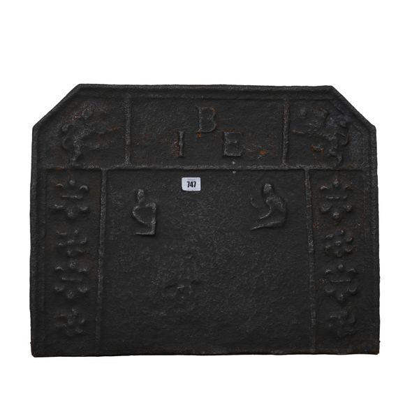 A CAST IRON FIREBACK WITH INITIALS 'IEB'