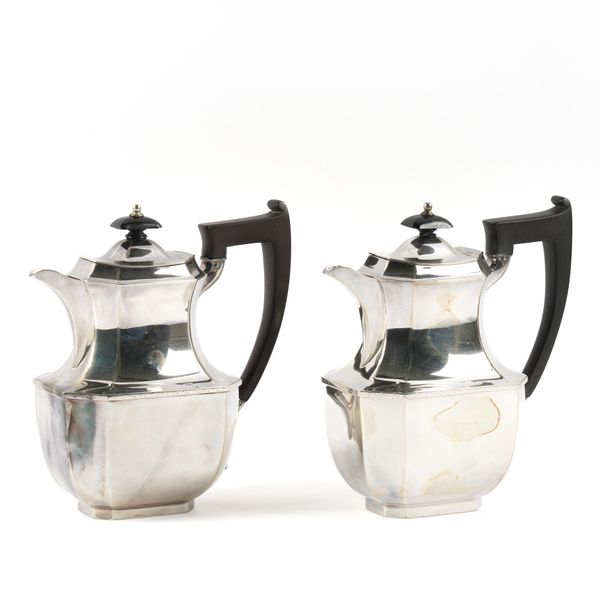 A PAIR OF SILVER HOT WATER JUGS (2)