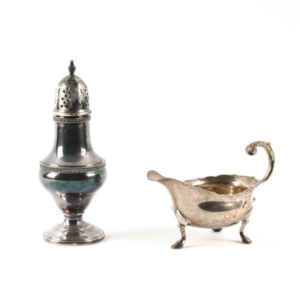 A SILVER SAUCEBOAT AND A SILVER SUGAR CASTER (2)