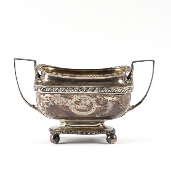 A GEORGE III SILVER TWIN HANDLED SUGAR BOWL