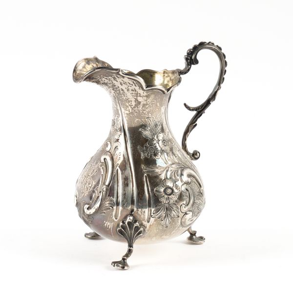 A VICTORIAN SILVER MILK JUG