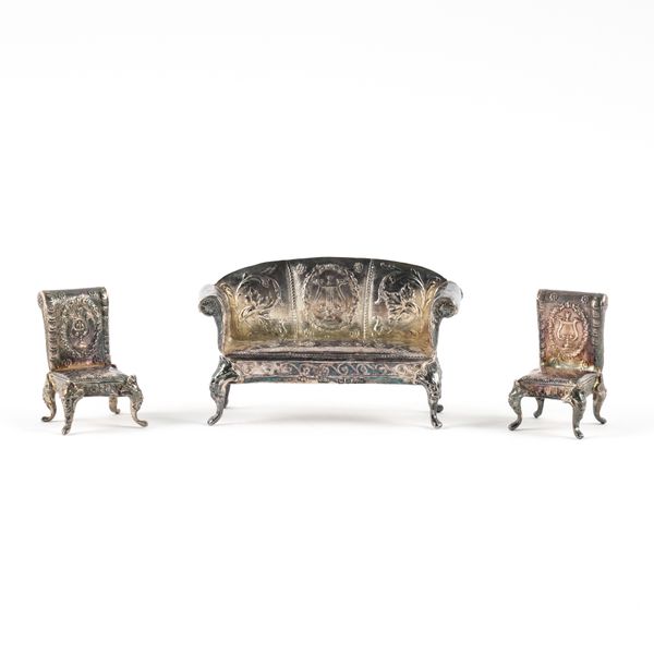 A SILVER MINIATURE THREE PIECE SUITE (3)