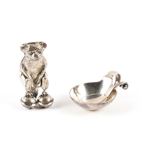 A GEORG JENSEN STERLING SALT AND SPOON AND A SILVER RATTLE FINIAL (3)