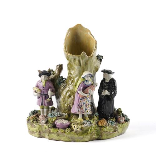 A STAFFORDSHIRE PEARLWARE TITHE PIG SPILL VASE GROUP