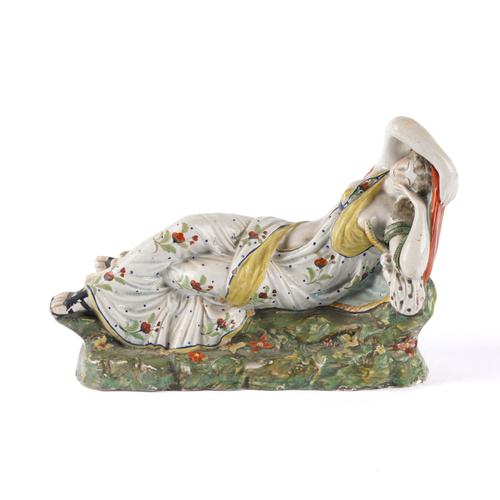 A STAFFORDSHIRE PEARLWARE FIGURE OF CLEOPATRA