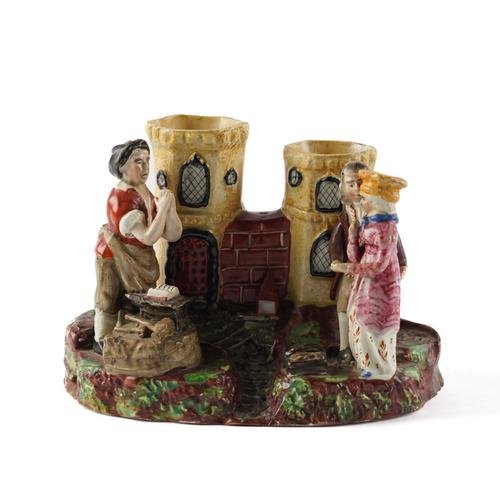 A STAFFORDSHIRE PEARLWARE GRETNA GREEN SPILL VASE GROUP