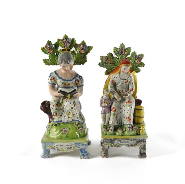 TWO OBADIAH SHERRATT- TYPE PEARLWARE FIGURES OF `THE READING MAID' AND `WIDOW'