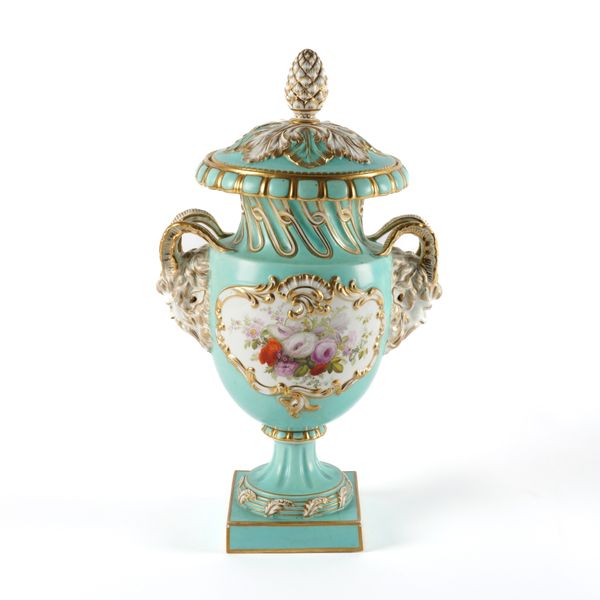 AN ENGLISH PORCELAIN TWO- HANDLED VASE AND COVER (2)