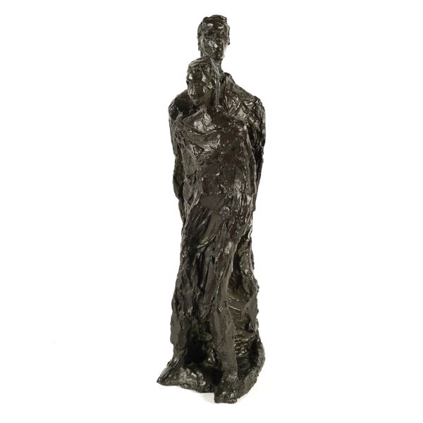 A PATINATED BRONZE GROUP SCULPTURE OF A STANDING MAN AND WOMAN